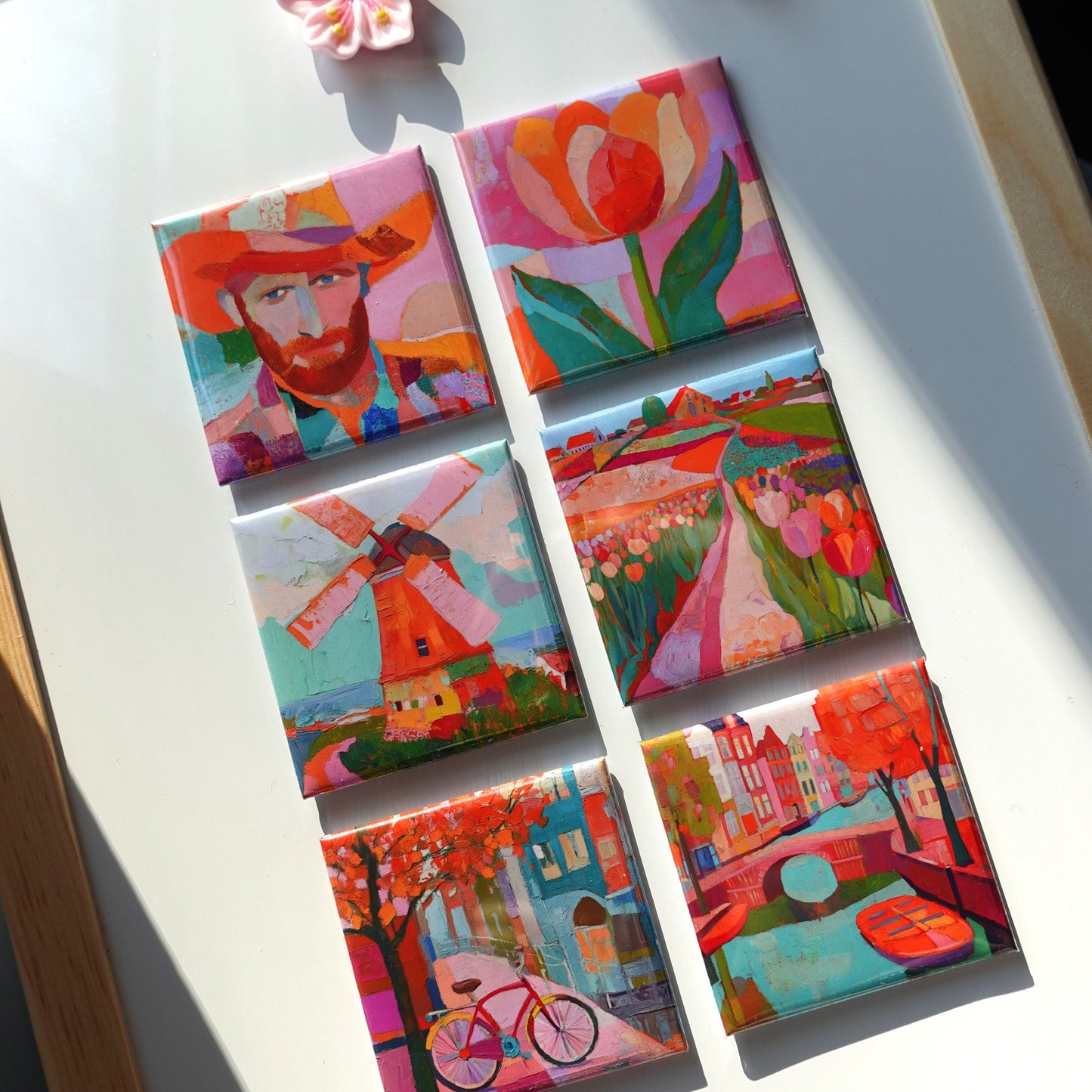 Bright and vibrant Dutch-themed fridge magnets featuring tulips, canals, and Van Gogh